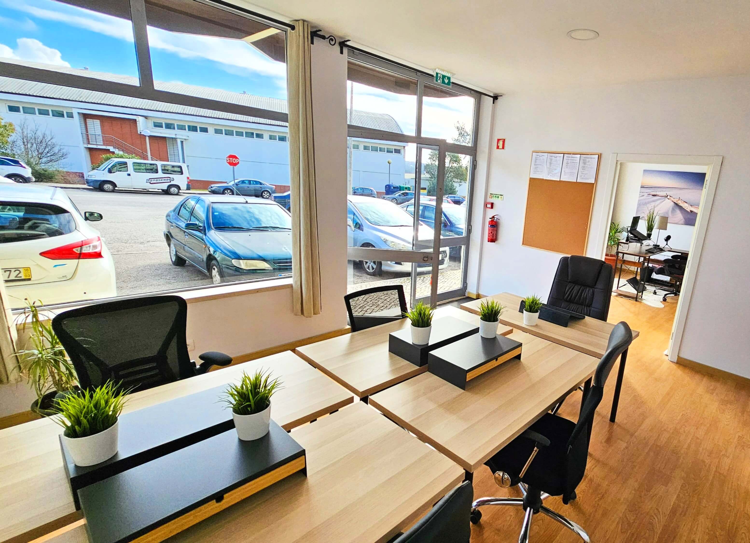 Main coworking space with desks and natural light